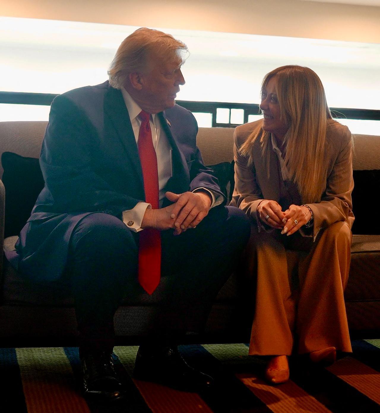 In this handout picture released on June 17, 2026 US President Donald Trump speaks with Italy's Prime Minister Giorgia Meloni during G7 summit, in Evian, France, June 17, 2026. (Photo by Handout/Palazzo Chigi press office/AFP)