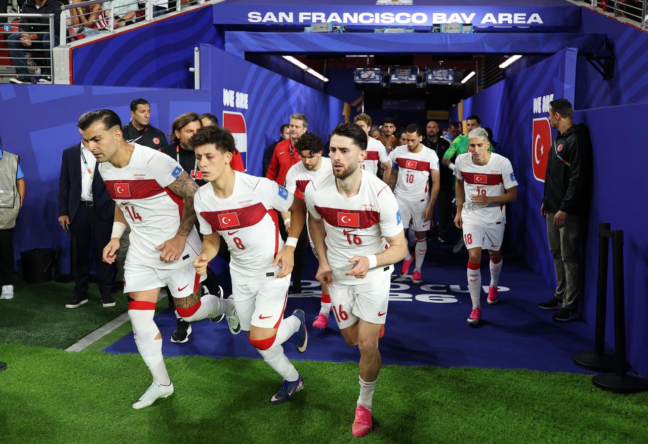 Abdulkerim Bardakci #14, Arda Guler #8 and Ismail Yuksek #16 of Turkiye run out of the tunnel with teammates during the FIFA World Cup 2026 Group D match between Türkiye and Paraguay at San Francisco Bay Area Stadium on June 19, 2026 in Santa Clara, California. (AFP Photo)