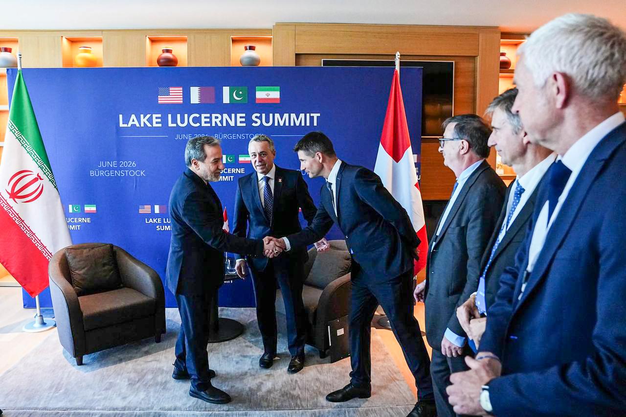 Iranian Foreign Minister Abbas Araghchi (L) meets with his Swiss counterpart Ignazio Cassis (R) in the resort town of Burgenstock, Switzerland, June 21, 2026. (Photo via Iranian Foreign Ministry/Handout)
