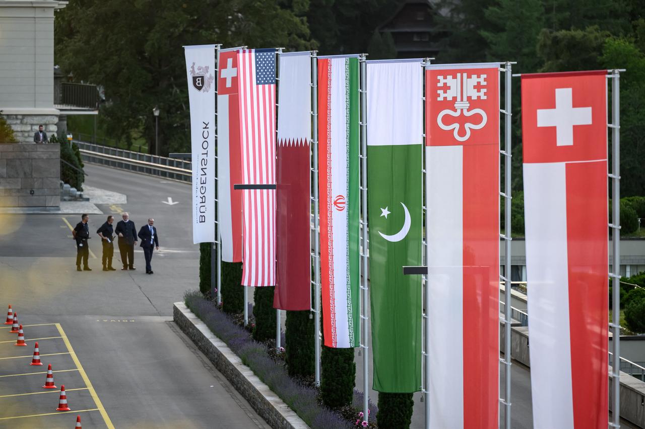 Flags of Switzerland, United States, Qatar, Pakistan and local Swiss canton of Nidwalden are photographed at the Burgenstock luxury hotel complex overlooking Lake Lucerne, Switzerland, June 21, 2026. (AFP Photo)