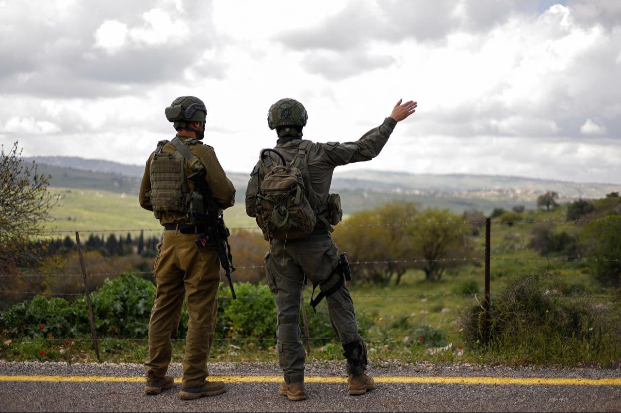 Israeli soldiers patrol along the Israel-Lebanon border, April 10, 2026. (AFP Photo)