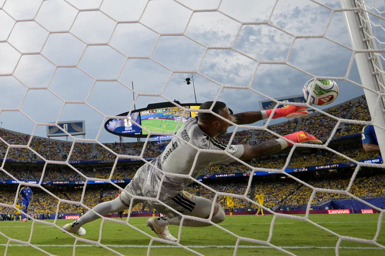 Room's record 15 saves secure historic World Cup point for Curacao