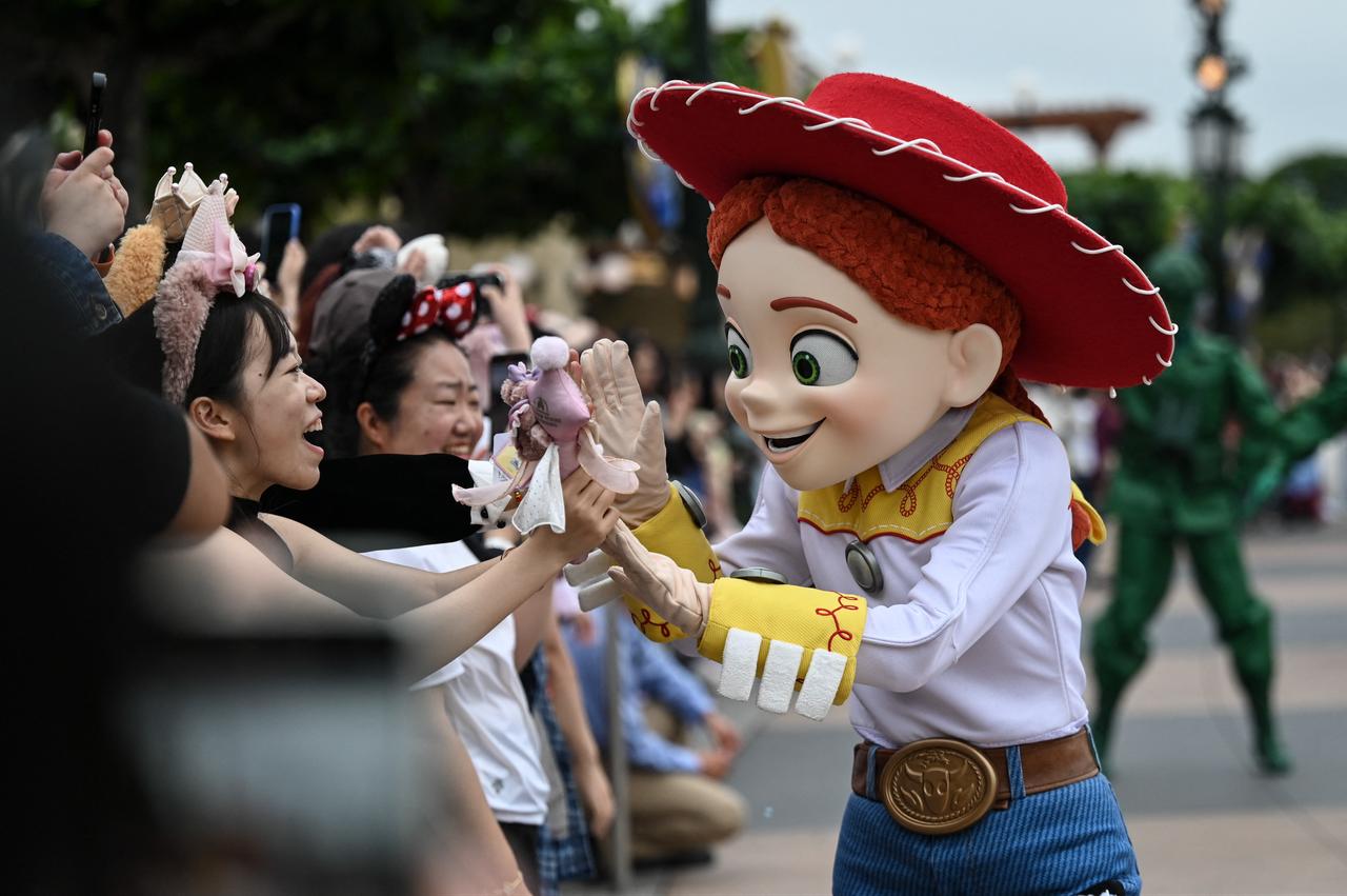 Toy Story character Jessie interacts with visitors during a parade at Shanghai Disney Resort in Shanghai, China, on June 16, 2026. (AFP Photo)