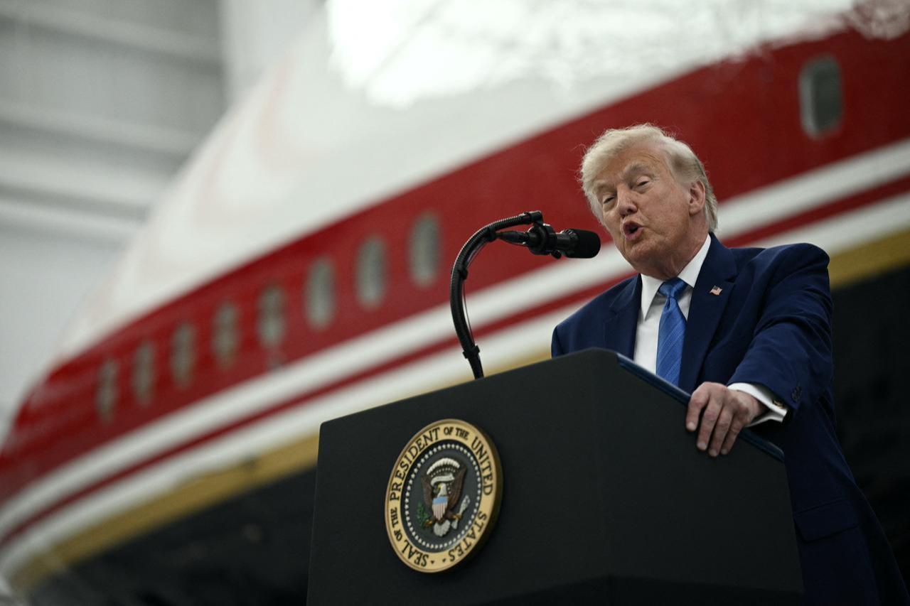 US President Donald Trump speaks in front of the new Air Force One, gifted to him by Qatar, in a hangar at Joint Base Andrews in Maryland on June 19, 2026. (AFP Photo)