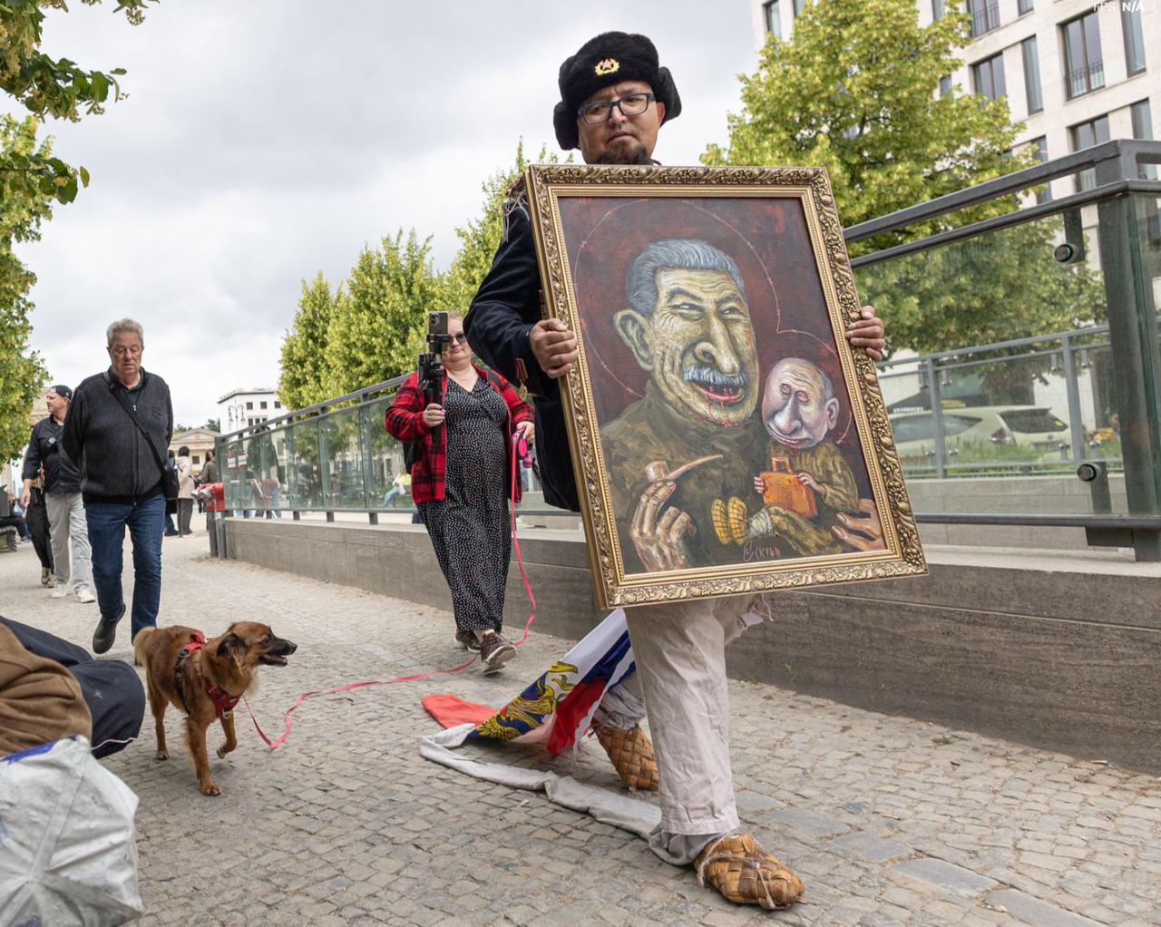 Semyon Skrepetsky walks through central Berlin during Russia Day on 12 June, days before he was shot. (SOPA Images)