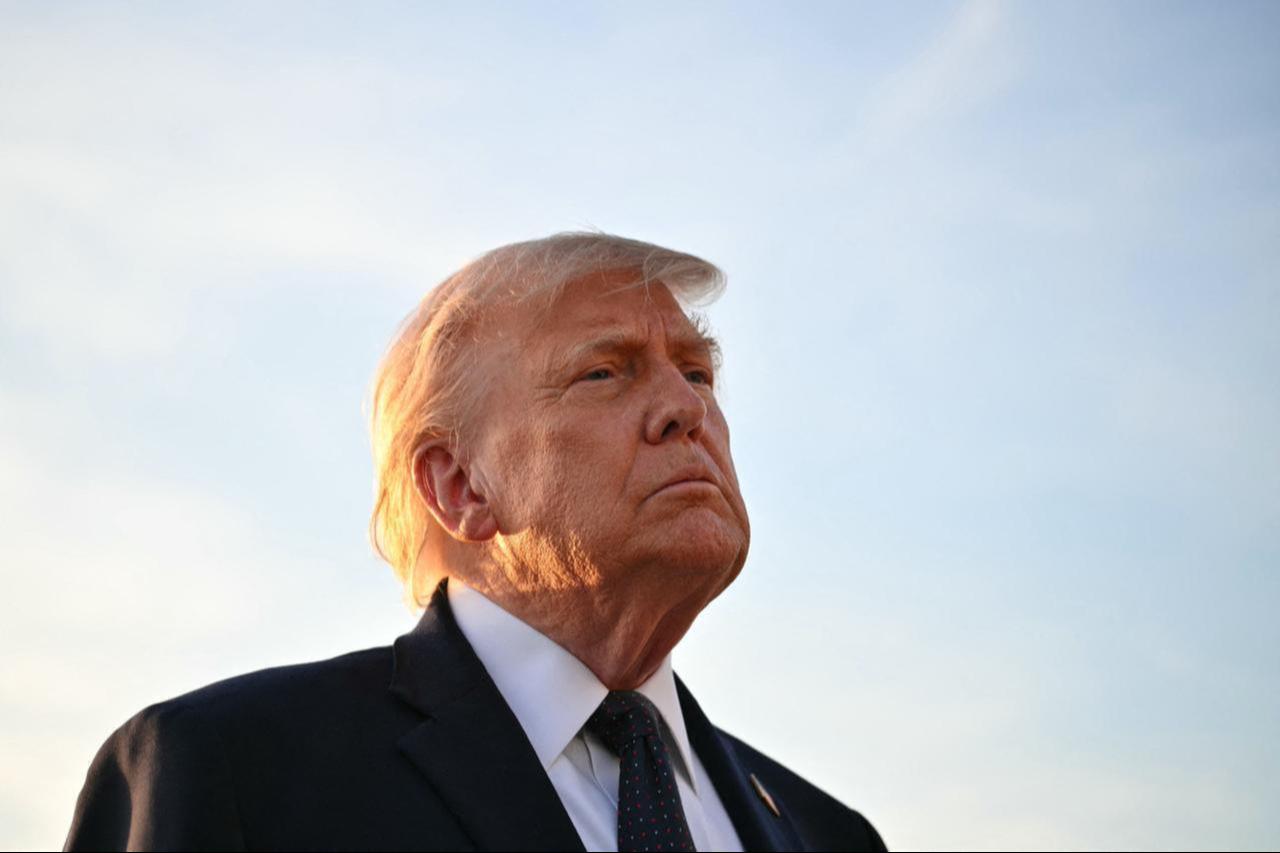US President Donald Trump looks on after arriving at Paris Orly Airport en route to a dinner at Orly Airport, south of Paris, June 17, 2026. (AFP Photo)