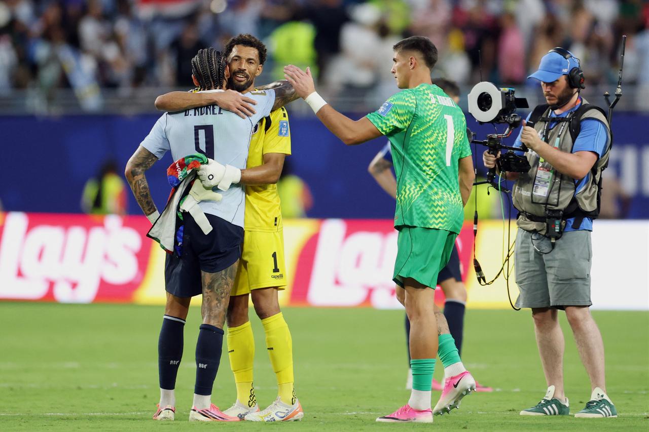 Uruguay's forward #09 Darwin Nunez greets Cape Verde's goalkeeper #01 Vozinha at the end of the 2026 World Cup Group H football match between Uruguay and Cape Verde at the Miami Stadium in Miami Gardens, FL, on June 21, 2026. (AFP Photo)