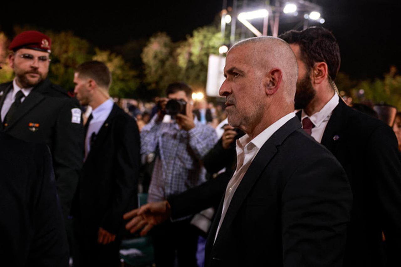 Israel's domestic security agency 'Shin Bet' chief Ronen Bar (R) attends a ceremony at the Yad Vashem Holocaust Memorial in Jerusalem, April 23, 2025. (AFP Photo)