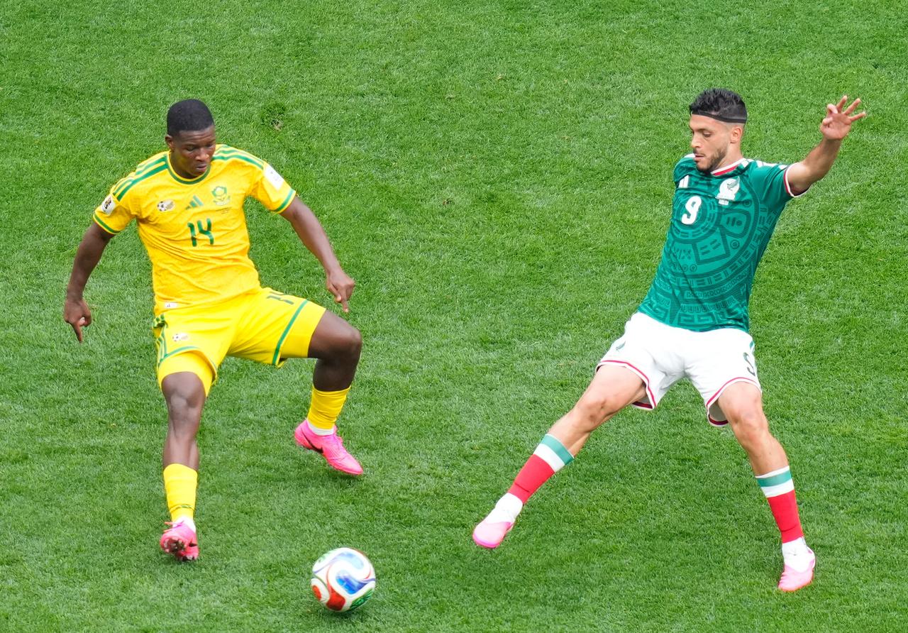 Raul Jimenez of Mexico in action against Mbekezeli Mbokazi of South Africa during the World Cup First Stage Group A match between Mexico and South Africa at Estadio Azteca (Mexico Stadium) in Mexico City, Mexico, June 11, 2026. (AA Photo)