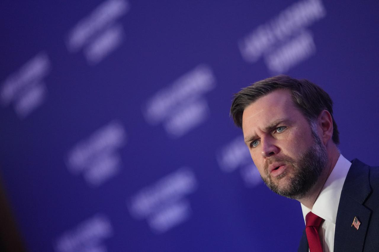 US Vice President JD Vance speaks to members of the media before boarding Air Force Two at Emmen Military Air Base in Emmen, Switzerland, June 22, 2026. (AFP Photo)