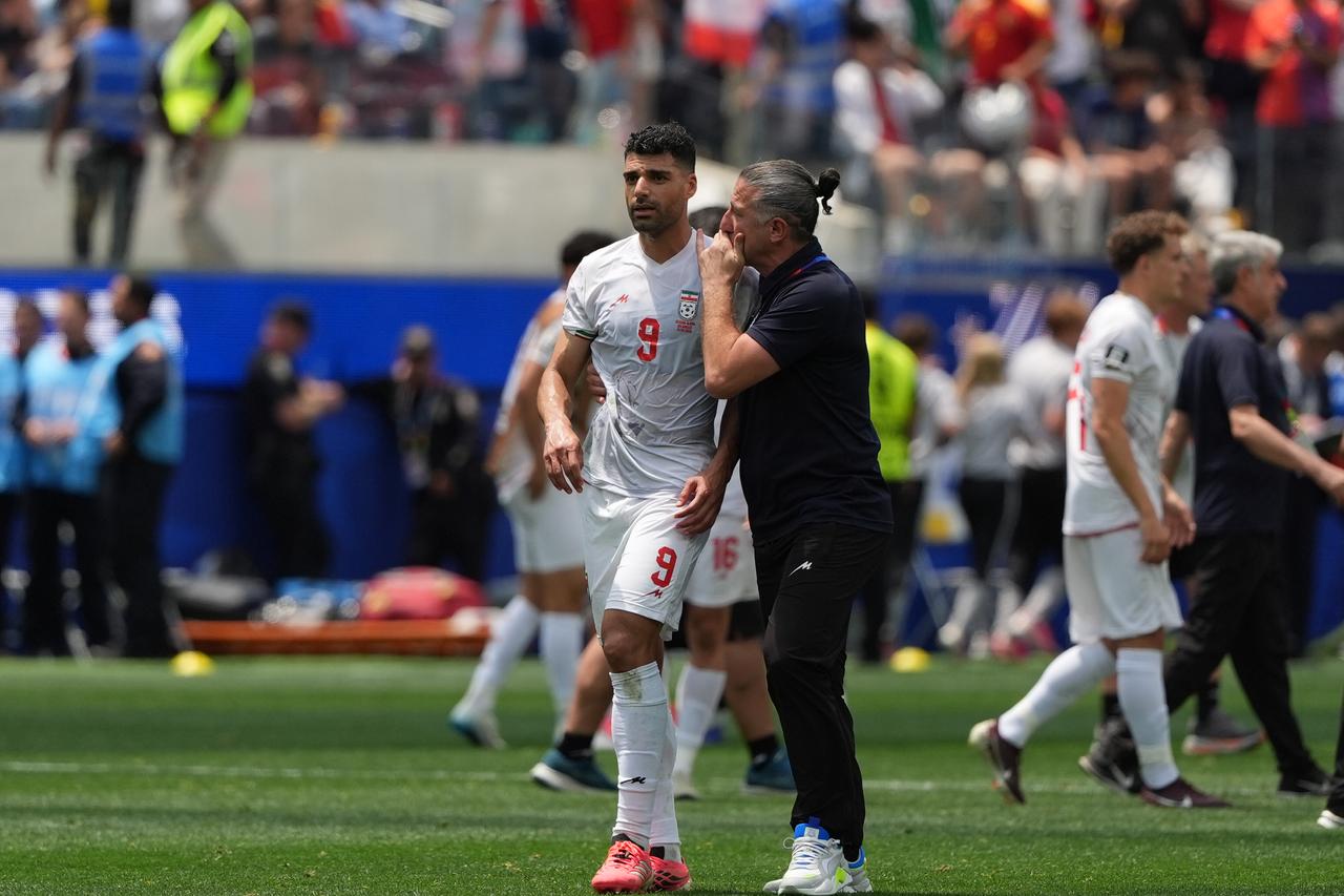 Mehdi Taremi (L) of Iran is seen during the 2026 FIFA World Cup First Stage Group G match between Belgium and IR Iran at the Los Angeles Stadium (SoFi Stadium) in Inglewood, California, United States, June 21, 2026. (AA Photo)