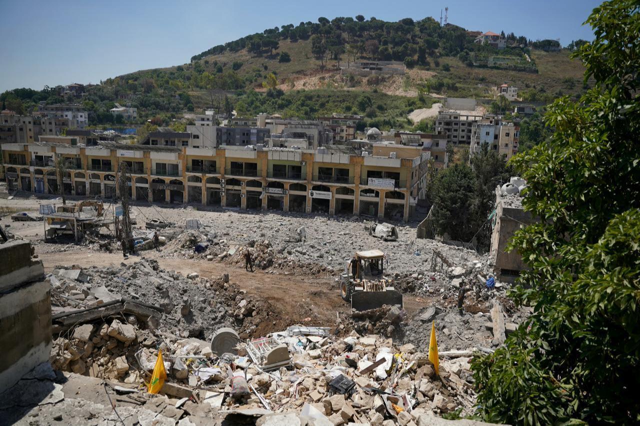 A bulldozer removes the rubble from the main marketplace destroyed by the Israeli military in the southern city of Nabatieh on June 21, 2026. (AFP Photo)