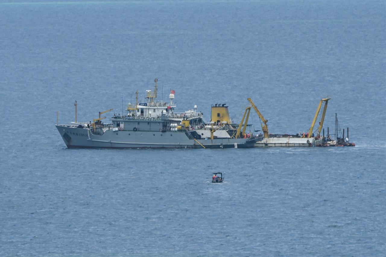 Ships identified by the Philippine Coast Guard as Chinese research vessels are seen at Scarborough Shoal in the disputed South China Sea, June 15, 2026. (AFP Photo)