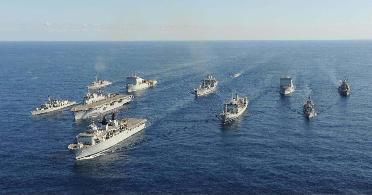 Royal Navy vessels sail in formation during a maritime exercise at sea. (Photo via UK Ministry of Defence)