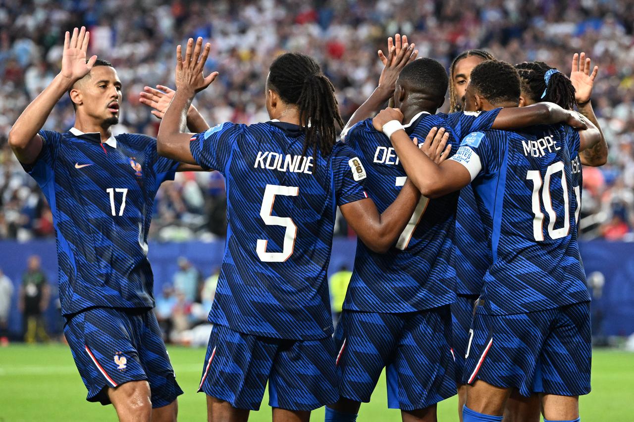 France's forward #07 Ousmane Dembele celebrates scoring his team's third goal with teammates during the 2026 World Cup Group I football match between France and Iraq at the Philadelphia Stadium in Philadelphia, US, on June 22, 2026.  (AFP Photo)