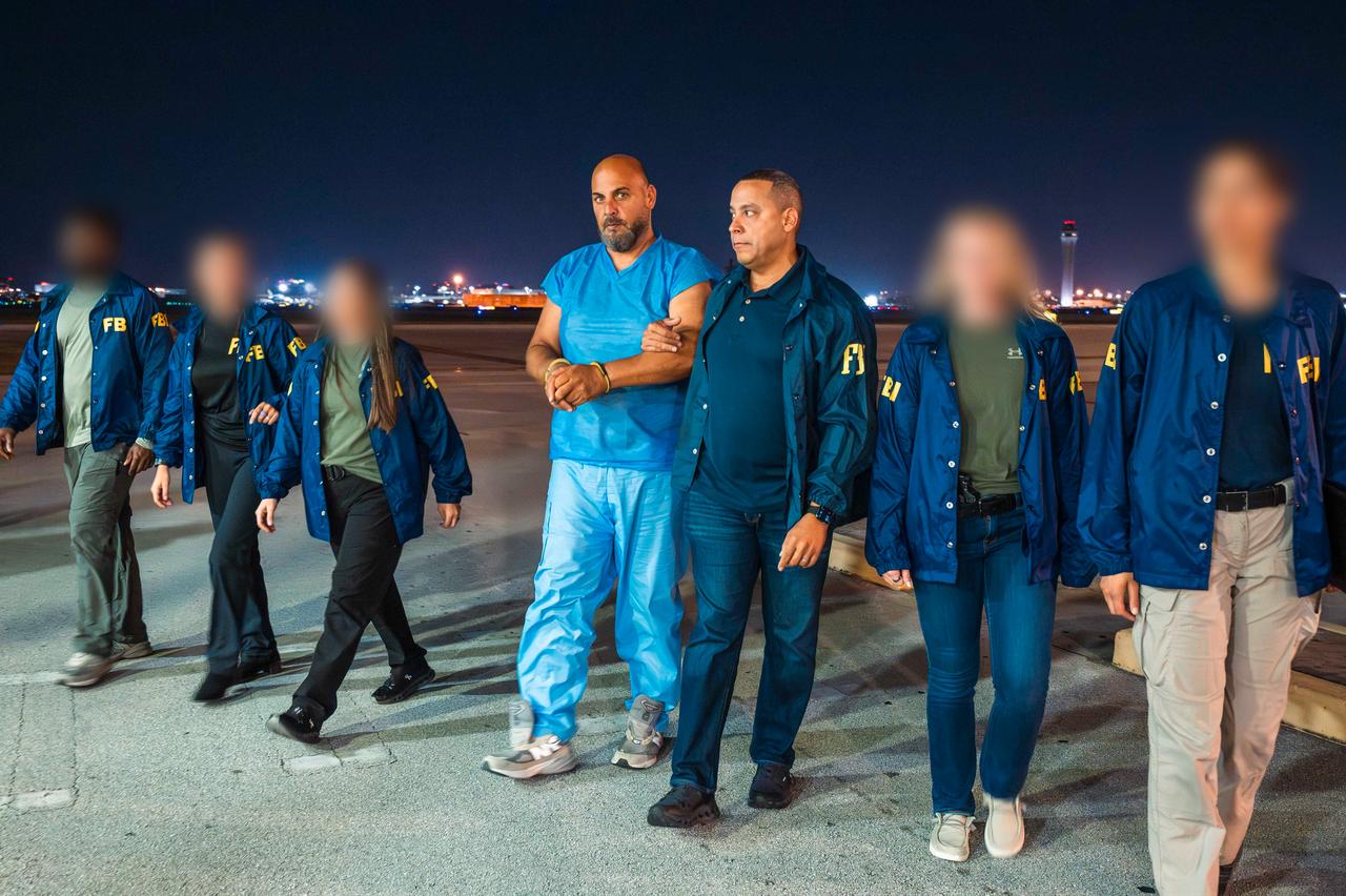 Photo shows the Ibrahim Khaldoon Hilmi, who is charged with one of the biggest Medicare scams in history, being escorted by FBI officials during his arrival in South Florida, US, June 2026. (Photo via X/@FBIMiamiFL)