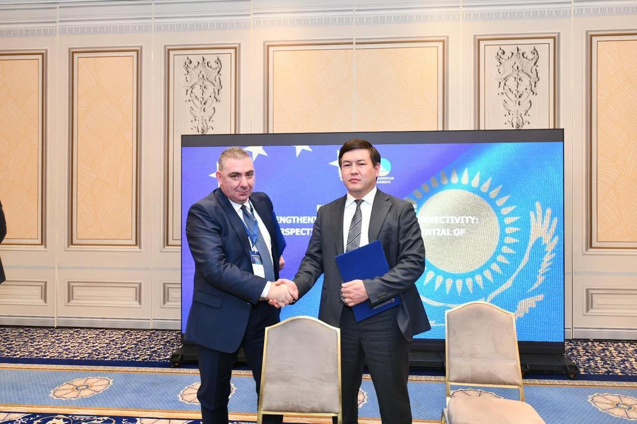 Officials shake hands after the signing of an agreement during the "Strengthening EU-Kazakhstan Connectivity" business conference in Brussels, Belgium, June 22, 2026. (Photo via Facebook/@railways.kz)