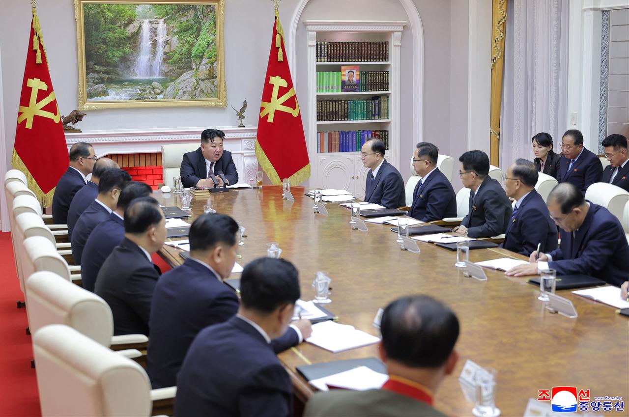 This undated picture released by North Korea's official Korean Central News Agency (KCNA) on June 23, 2026 shows North Korean leader Kim Jong Un (C) speaks at the 3rd Political Bureau Meeting of the Ninth Central Committee of the Workers' Party of Korea, in North Pyongan Province. (Photo via Korean Central News Agency (KCNA)/HO/AFP)