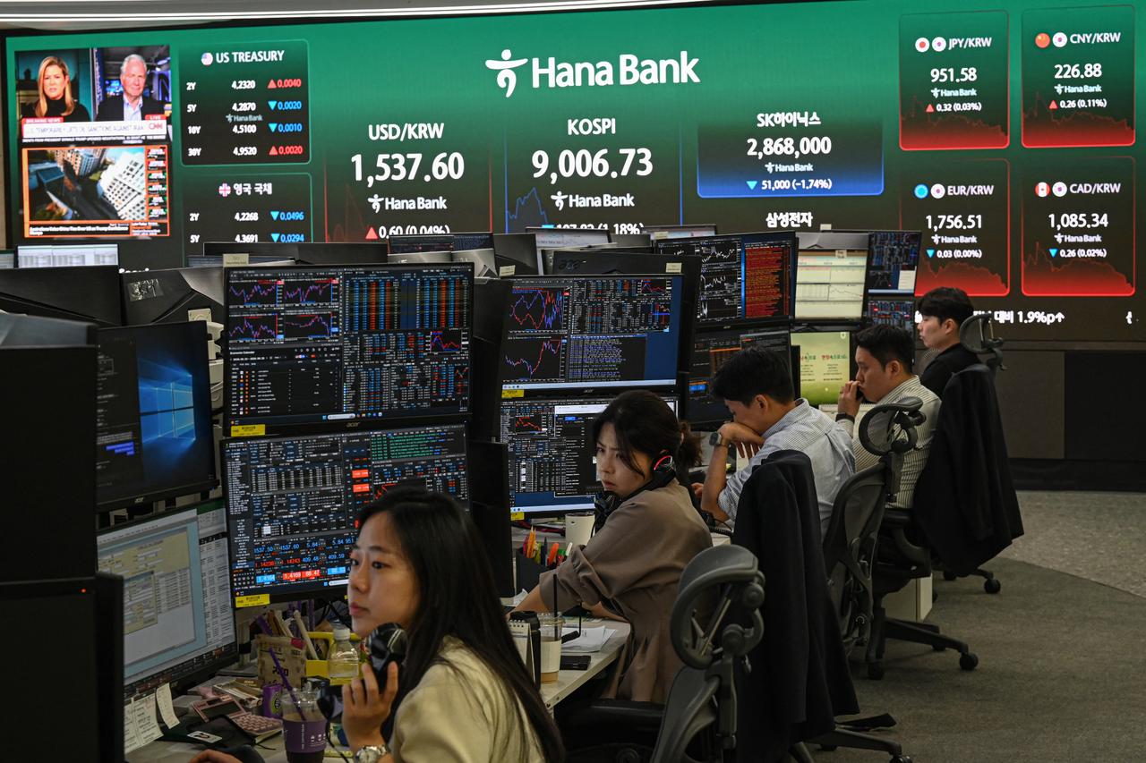 Stocks slide as stronger dollar weighs on markets, oil extends decline