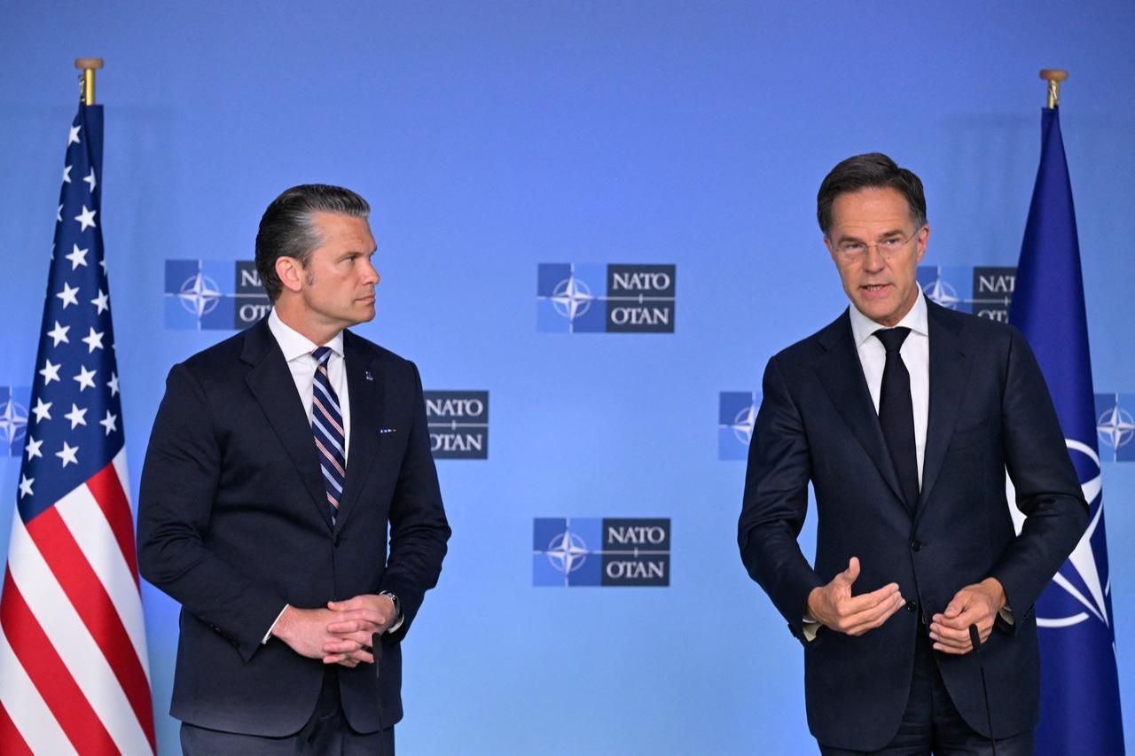 NATO Secretary General Mark Rutte (R) and US Secretary of Defence Pete Hegseth deliver remarks before a NATO Defence Ministers meeting at the NATO headquarters, in Brussels, on June 18, 2026. (AFP Photo)