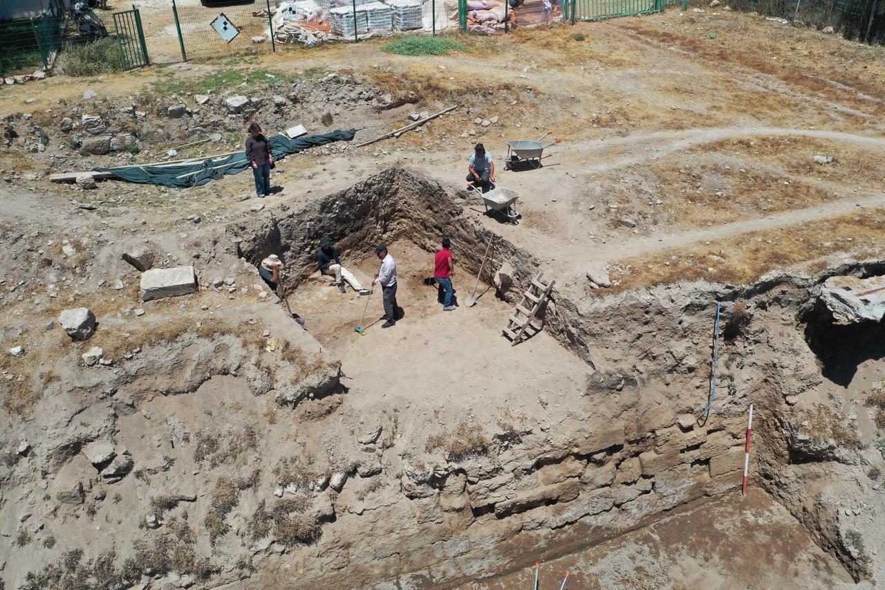 Workers continue excavation around the moat of Harran Selahaddin Eyyubi Castle Palace in Sanliurfa, Türkiye, June 23, 2026. (AA Photo)