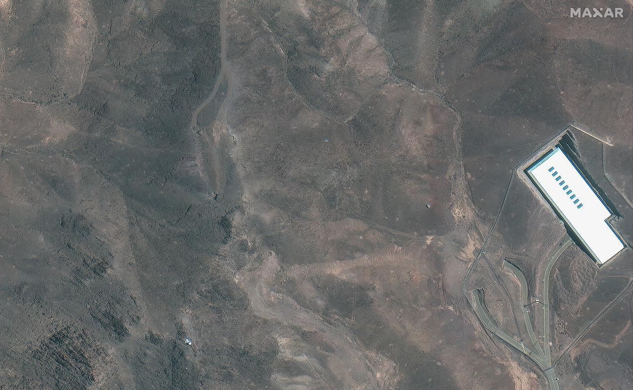 This handout satellite picture taken on June 19, 2025, shows a view of Iran's Fordow Fuel Enrichment Plant (FFEP), northeast of the city of Qom. (Photo by Satellite image ©2025 Maxar Technologies/AFP)
