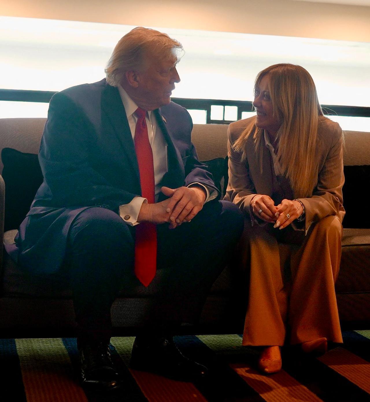 In this handout picture released by the Palazzo Chigi Press Office on June 17, 2026 US President Donald Trump speaks with Italy's Prime Minister Giorgia Meloni during the G7 summit, in Evian, eastern France, on June 17, 2026. (AFP Photo)