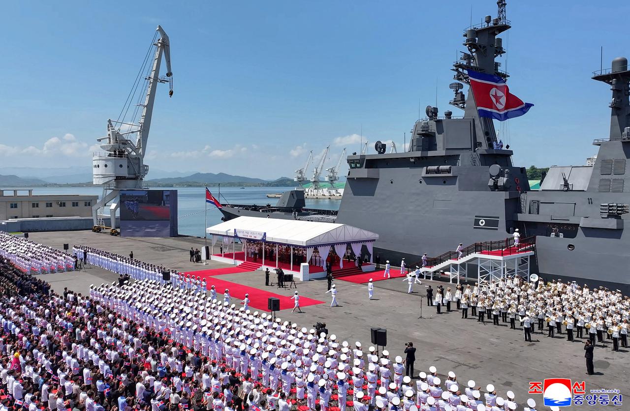 This picture taken on June 23, 2026 and released by North Korea's official Korean Central News Agency (KCNA) on June 24, 2026 shows a commissioning ceremony of the new-type multi-mission destroyer Choe Hyon at Nampo port in North Korea. (Photo via Korean Central News Agency (KCNA)/HO/AFP)