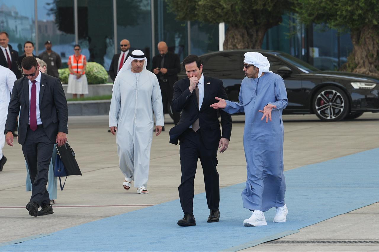 US Secretary of State Marco Rubio (2nd R) walks alongside UAE Foreign Minister Sheikh Abdullah bin Zayed Al-Nahyan (R) before boarding a US Air Force aircraft at Al-Bateen Executive Airport, en route to Kuwait, in Abu Dhabi, June 24, 2026. (AFP Photo)
