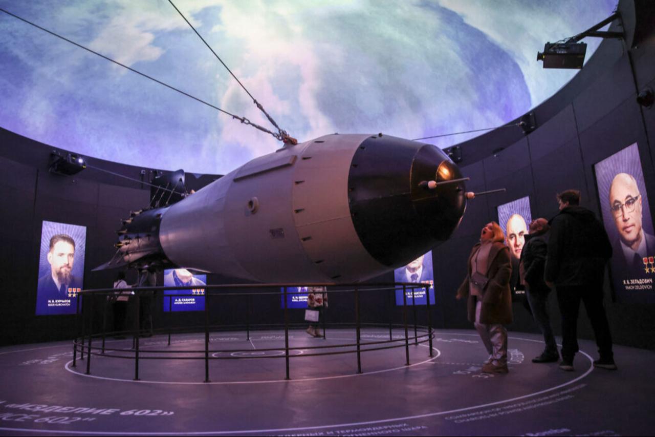 Visitors look at a model of a Soviet AN-602 thermonuclear aerial bomb, also known as the Tsar Bomb, at the All-Russia Exhibition Centre (VDNH) in Moscow, November 4, 2023. (AFP Photo)