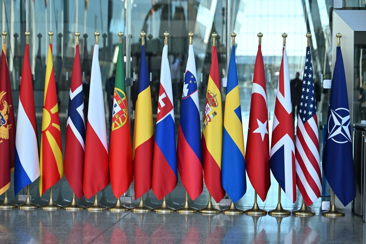 Flags of NATO member countries are displayed at NATO Headquarters as defense ministers attend the NATO Defence Ministers Meeting in Brussels, Belgium, on June 18, 2026. (AA Photo)