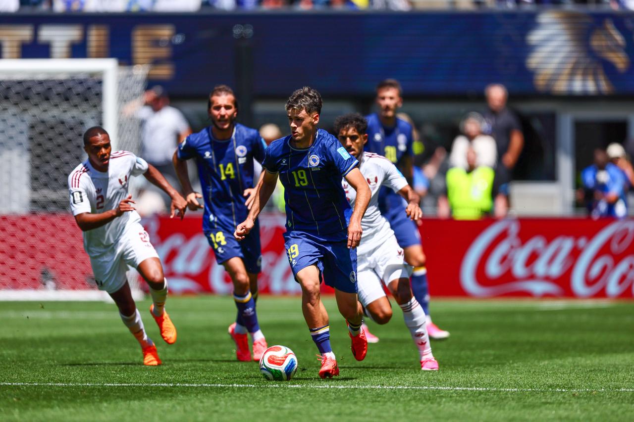 Kerim Alajbegovic (19) of Bosnia and Herzegovina in action during the 2026 FIFA World Cup First Stage Group B match between Bosnia and Herzegovina and Qatar at Lumen Field (Seattle Stadium) in Seattle, Washington, United States on June 24, 2026. (AA Photo)