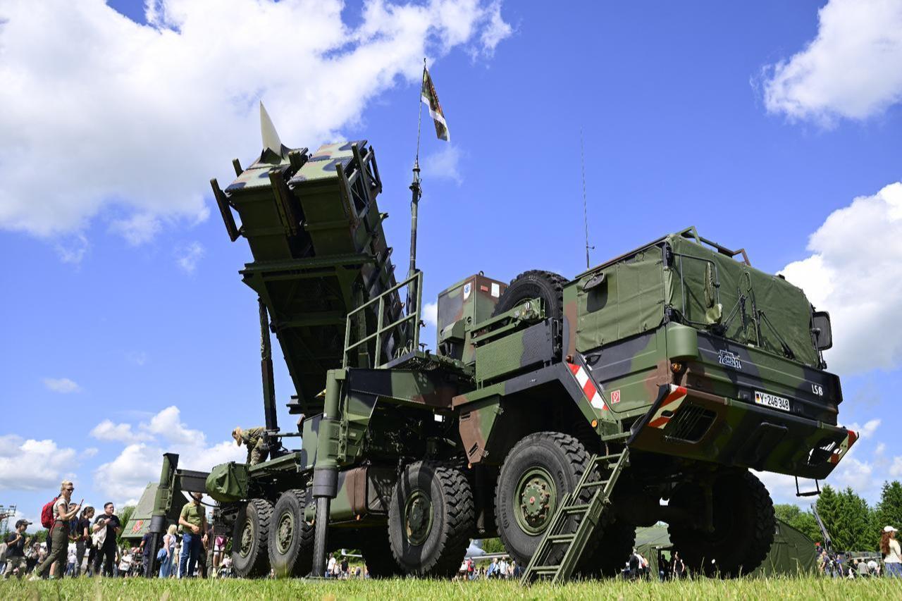 Visitors queue to take a closer look at a Patriot missile launcher during the Armed Forces Day at the Airbase in Laage, Germany, June 6, 2026. (AFP Photo)
