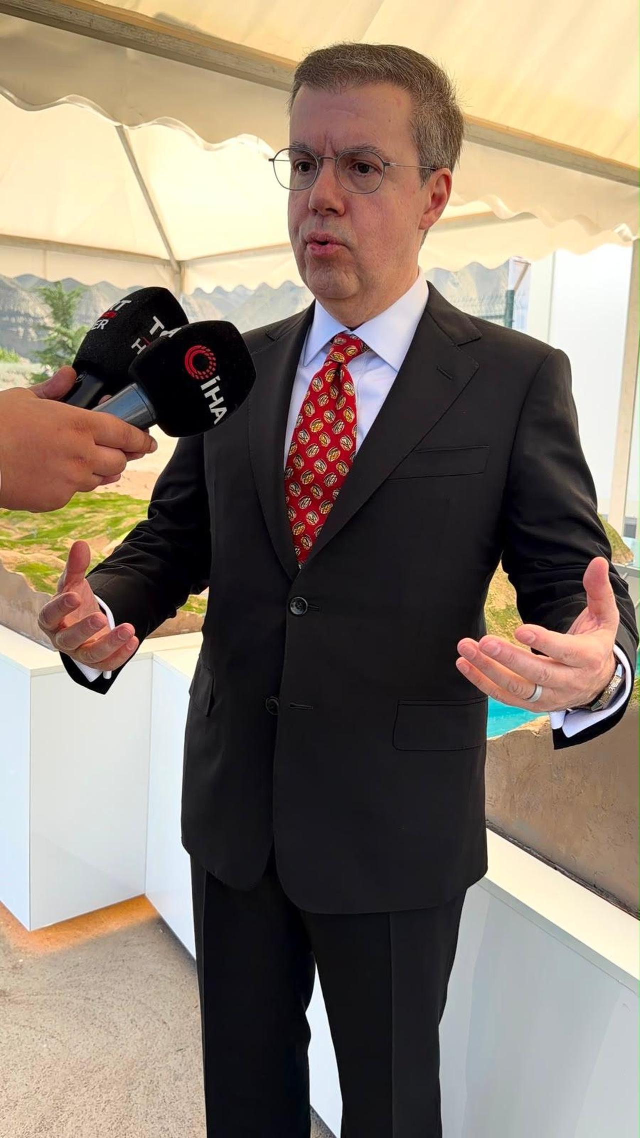 Ahmet Mucahid Oren, chairman of Ihlas Holding, speaks to reporters during the groundbreaking ceremony for the Kazarman Hydropower Plant project in Kyrgyzstan, June 25, 2026. (IHA Photo)