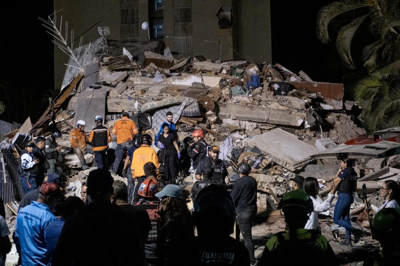 Rescue workers search through the rubble of a collapsed building following a powerful earthquake in Caracas, Venezuela, on June 24, 2026. (AA Photo)