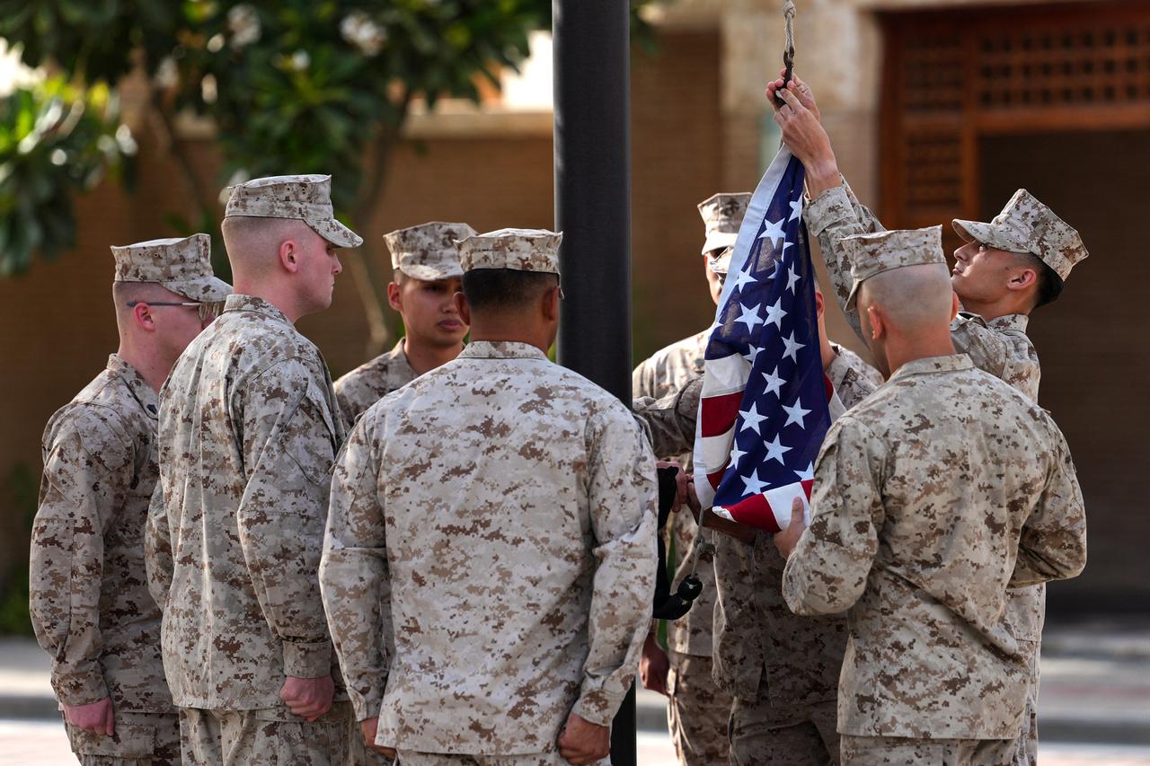 US Marines raise the flag at the US Embassy in Kuwait during a ceremony attended by US Secretary of State during his visit to the Middle East, in Kuwait City, June 24, 2026. (AFP Photo)
