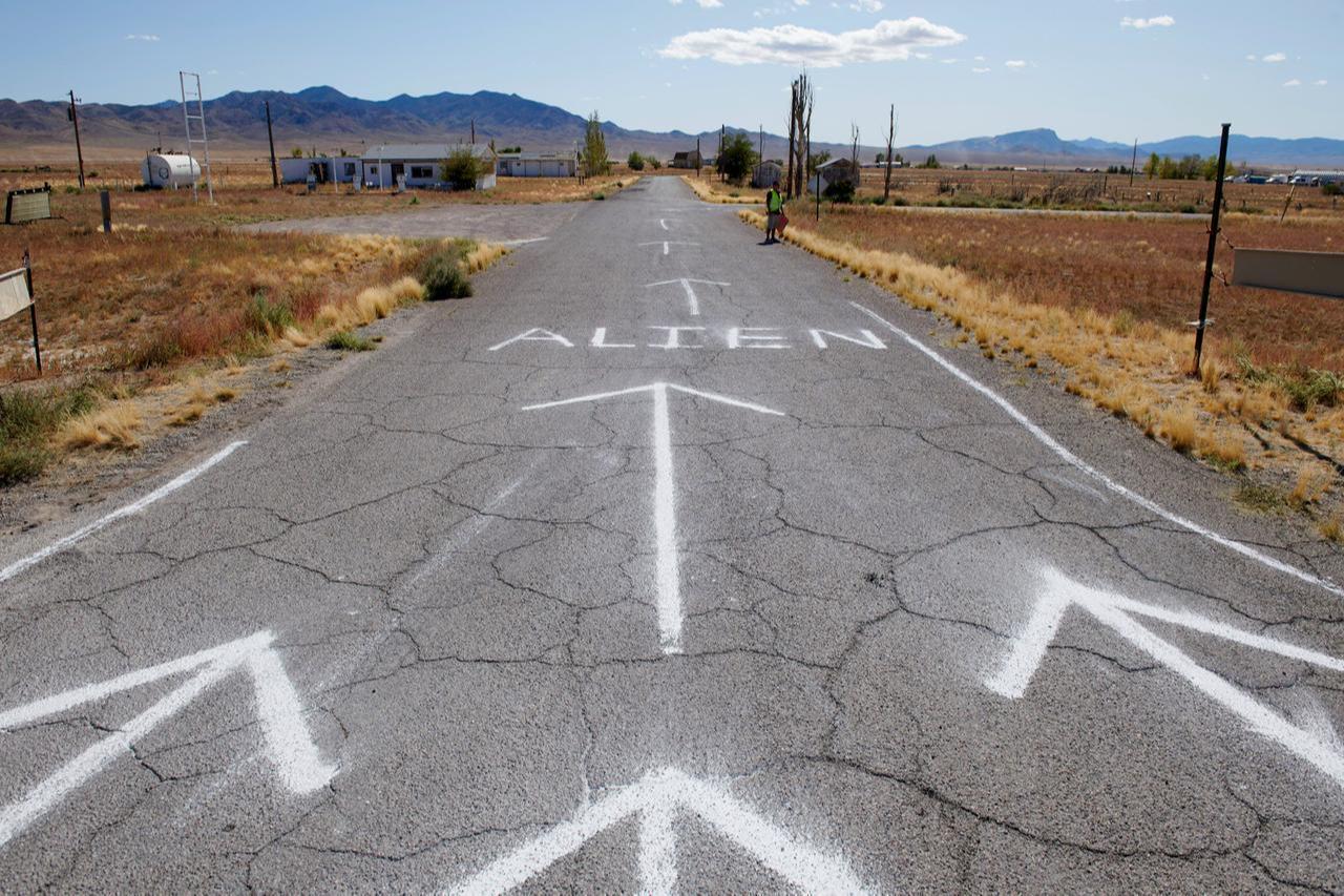 The entrance to Alienstock festival is marked on the road in Rachel, Nevada, on September 20, 2019. (AFP Photo)