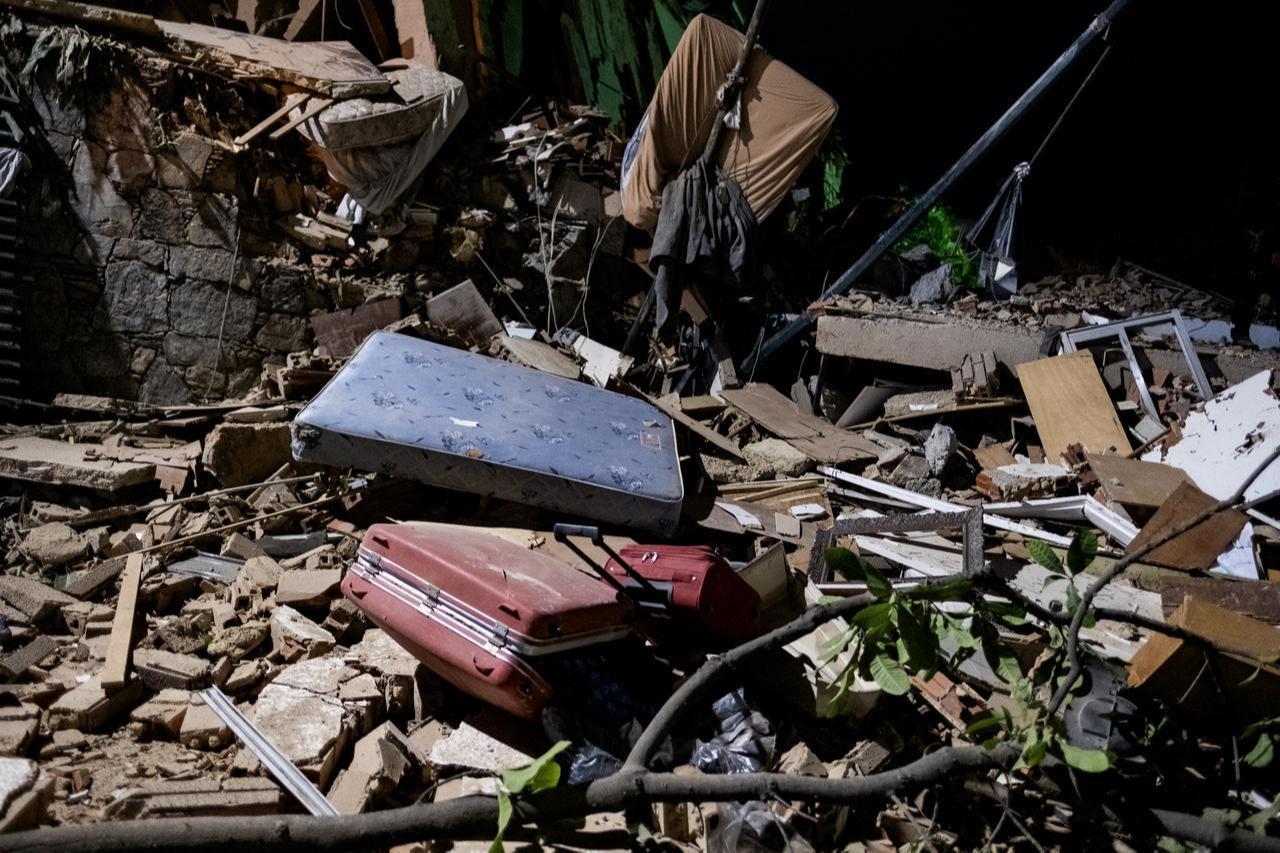 Personal belongings are seen among the rubble of a collapsed building following a powerful earthquake in Caracas, Venezuela, June 24, 2026. (AA Photo)