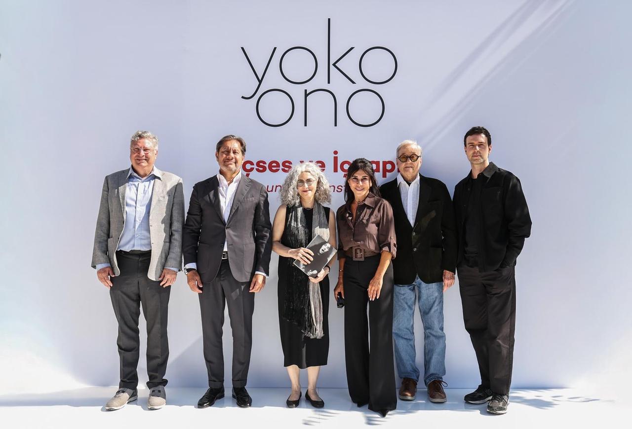 Officials and curators pose during the opening of Yoko Ono's "Insound and Instructure" exhibition at Sakip Sabanci Museum in Istanbul, Türkiye. (AA Photo)