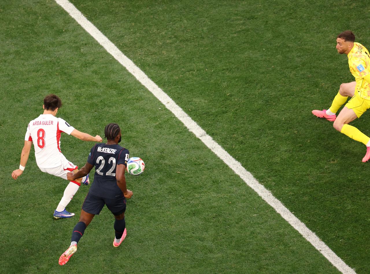 Türkiye's midfielder #08 Arda Guler (L) scores his team's first goal during the 2026 World Cup Group D football match between Türkiye and USA at the Los Angeles Stadium in Inglewood on June 25, 2026. (AFP Photo)
