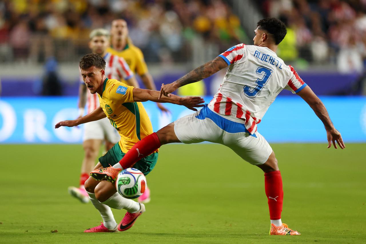 Australia secures place in World Cup last 32 following Paraguay draw