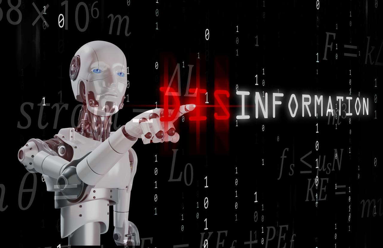 A humanoid robot points toward the word “disinformation”. (Adobe Stock Photo)