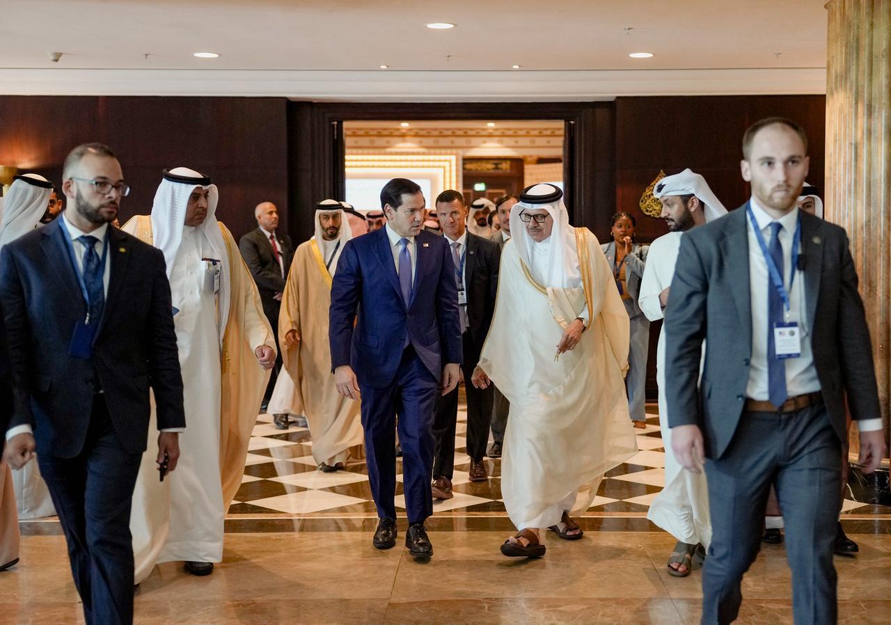 US Secretary of State Marco Rubio (C-L) walks alongside Bahrain's Foreign Minister following a meeting with foreign ministers of the Gulf Cooperation Council Member States (GCC), in Manama, June 25, 2026. (AFP Photo)