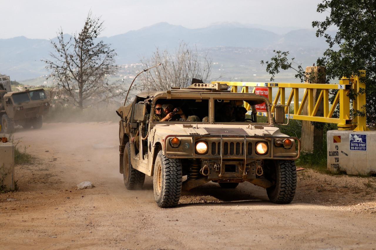 Israeli army soldiers patrol in their Humvees along the border with southern Lebanon, in the Upper Galilee of northern Israel, April 25, 2026. (AFP Photo)