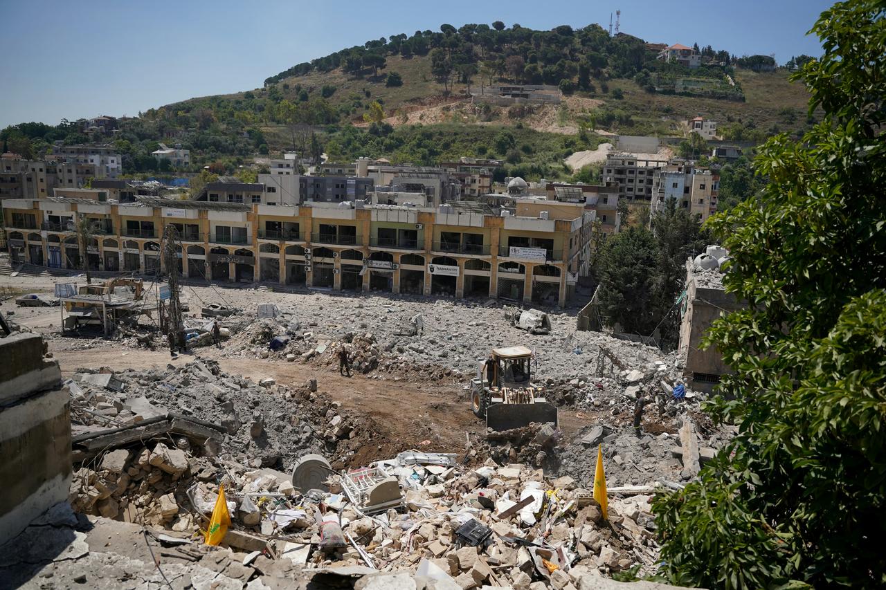 A bulldozer removes the rubble from the main market place destroyed by the Israeli military in the southern city of Nabatieh, June 21, 2026. (AFP Photo)