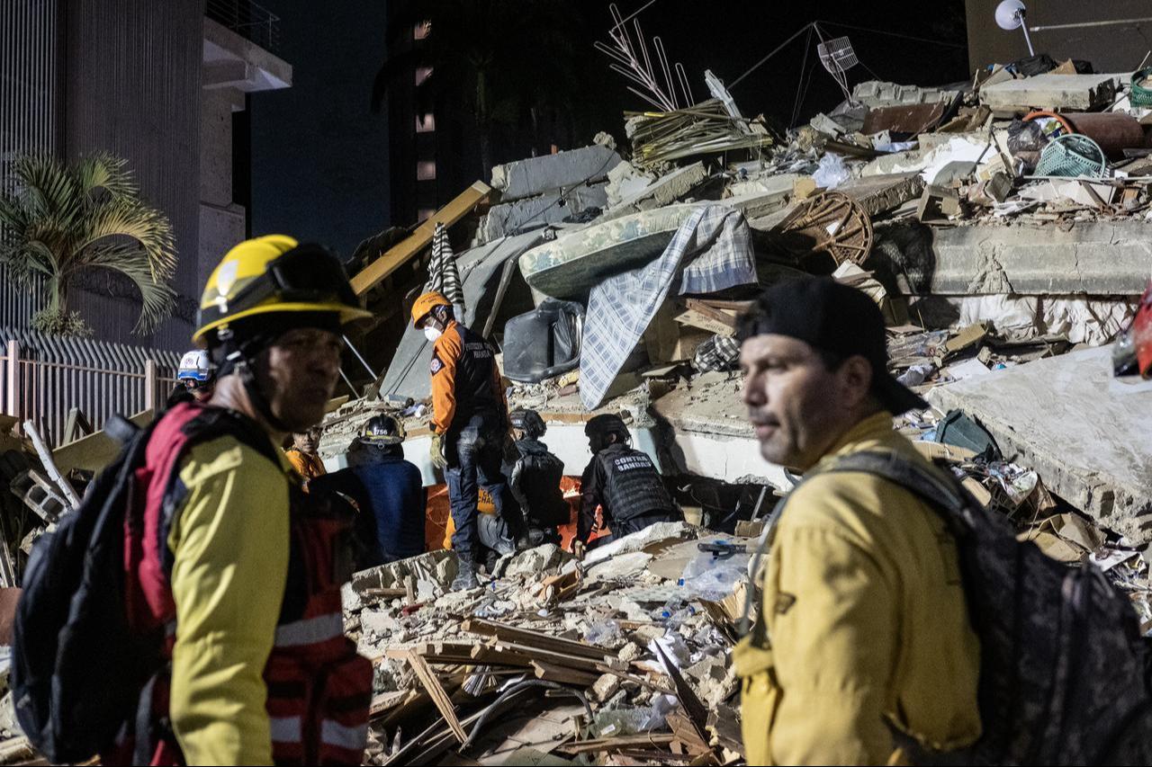 Rescue workers search through the rubble of a collapsed building following a powerful earthquake in Caracas, Venezuela, June 24, 2026. (AA Photo)