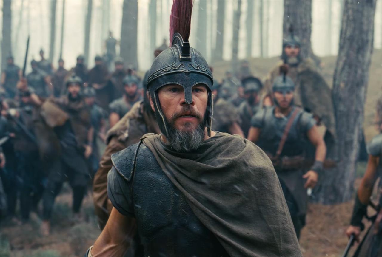 A still from the trailer for “The Odyssey” shows an armored warrior leading soldiers through a forest in a scene from the film. (Photo via “The Odyssey” trailer)