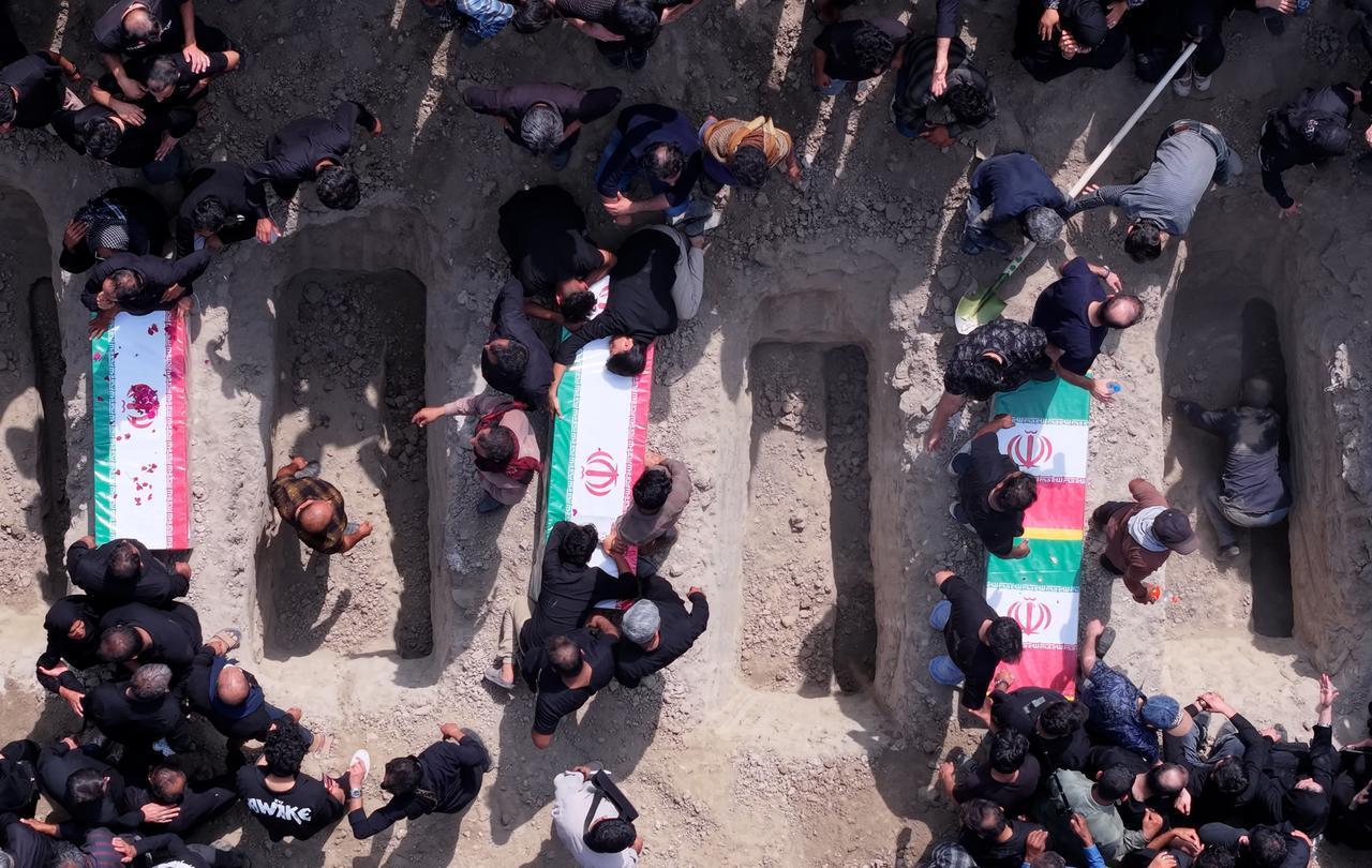 The coffins of students killed in an Israel-US attack on a girls' primary school are seen during a mass funeral ceremony in Minab, Hormozgan, Iran, March 3, 2026. (AA Photo)