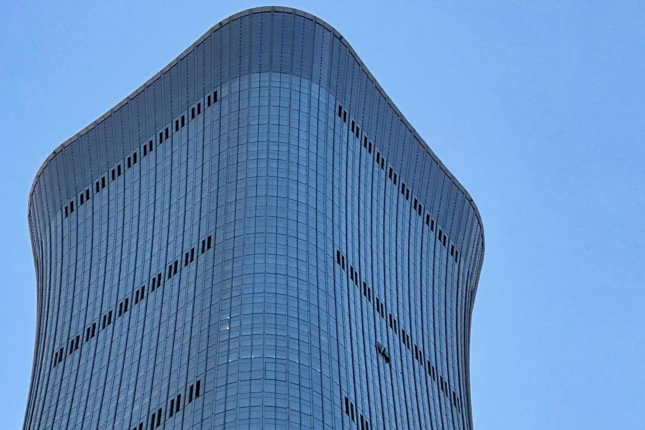 Car owner identified after Beijing tower plane crash, report says Image