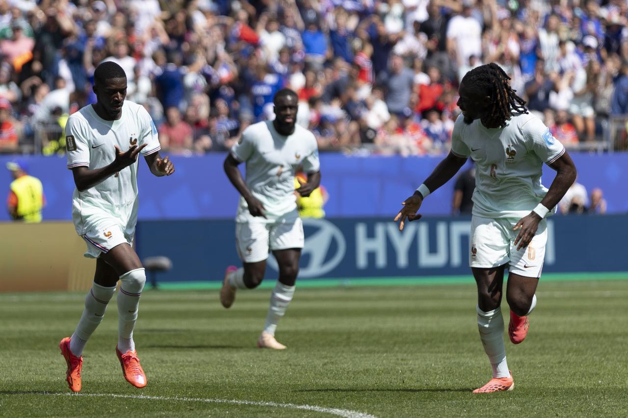 Dembele fires France through as Senegal stays alive with 5-0 rout